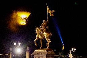 The Cauldron With The Olympic Flame Lit Flies Seen From The Louvre