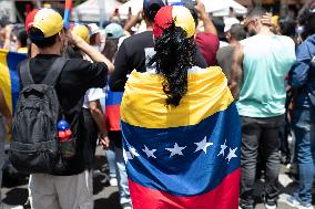 Venezuelans Demonstrate On The Day Of The Presidential Elections In Medellin