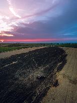 Combine Fire Consumes Wheat Harvest