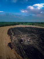 Combine Fire Consumes Wheat Harvest