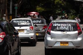 Venezuelans Demonstrate On The Day Of The Presidential Elections In Medellin