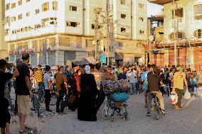 Palestinians Flee from Deir al-Balah - Gaza