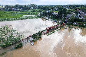 (SpotNews)CHINA-HUNAN-XIANGTAN-JUANSHUI RIVER-DIKE BREACH-RESCUE (CN)