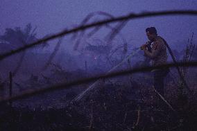 Firefighters Battle Peatland Fires In Indonesia