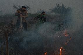 Firefighters Battle Peatland Fires In Indonesia