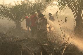 Firefighters Battle Peatland Fires In Indonesia