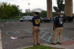 Crime Scene Investigators At Shooting Scene Near New York City Migrant Shelter