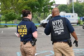 Crime Scene Investigators At Shooting Scene Near New York City Migrant Shelter