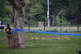 Crime Scene Investigators At Shooting Scene Near New York City Migrant Shelter