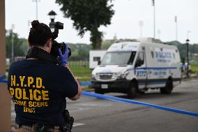 Crime Scene Investigators At Shooting Scene Near New York City Migrant Shelter