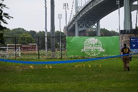 Crime Scene Investigators At Shooting Scene Near New York City Migrant Shelter