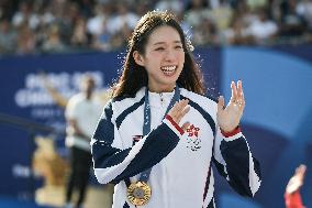 Paris 2024 - Fans welcome medalists at the Parc des Champions in Paris FA