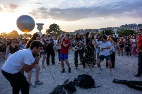 Paris 2024 - Olympic Cauldron Draws Crowds