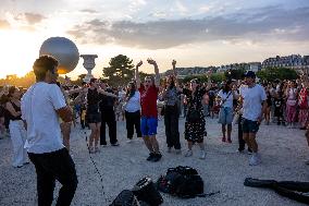 Paris 2024 - Olympic Cauldron Draws Crowds