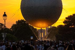 Paris 2024 - Olympic Cauldron Draws Crowds