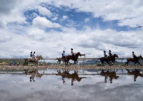 Guozhuang Dance At A Racecourse Event - China