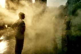 People Cool Off As Temperatures Rise In Paris