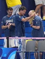 Paris 2024 - French and USA Coaches Of Leon Marchand In The Stands