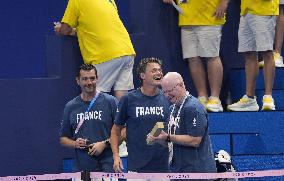 Paris 2024 - French and USA Coaches Of Leon Marchand In The Stands