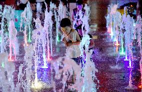 Children Cooled Off at The Fountain in Handan