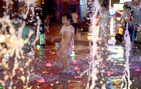 Children Cooled Off at The Fountain in Handan