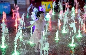 Children Cooled Off at The Fountain in Handan