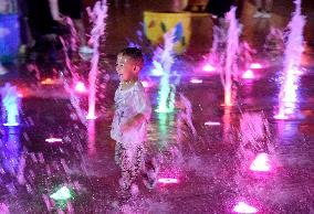 Children Cooled Off at The Fountain in Handan