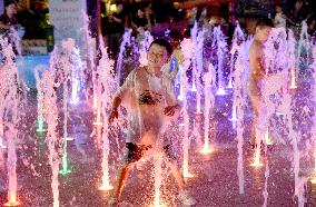 Children Cooled Off at The Fountain in Handan