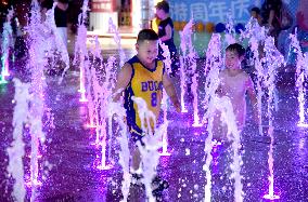 Children Cooled Off at The Fountain in Handan