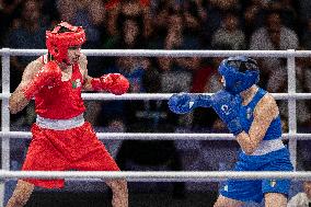 Paris 2024 - Controversal Biologically Male Boxer Imane Khelif in Women Category