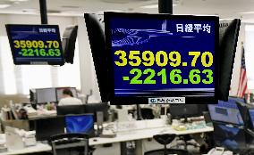 Tokyo stocks tumble