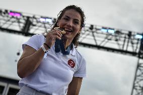 Paris 2024 - Fans welcome medalists at the Parc des Champions in Paris FA