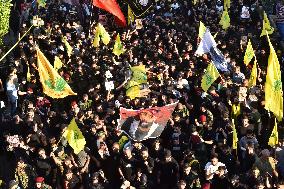 Hezbollah Fighters and Mourners Attend Funeral of Top Commander Fuad Shukr in Beirut