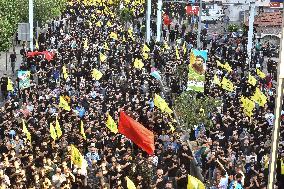 Hezbollah Fighters and Mourners Attend Funeral of Top Commander Fuad Shukr in Beirut