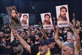 Hezbollah Fighters and Mourners Attend Funeral of Top Commander Fuad Shukr in Beirut