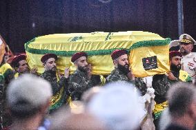 Hezbollah Fighters and Mourners Attend Funeral of Top Commander Fuad Shukr in Beirut