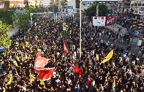 Hezbollah Fighters and Mourners Attend Funeral of Top Commander Fuad Shukr in Beirut