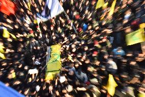 Hezbollah Fighters and Mourners Attend Funeral of Top Commander Fuad Shukr in Beirut