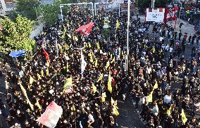 Hezbollah Fighters and Mourners Attend Funeral of Top Commander Fuad Shukr in Beirut