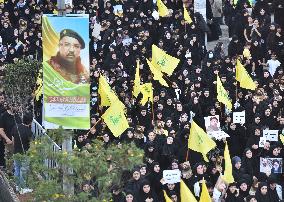 Hezbollah Fighters and Mourners Attend Funeral of Top Commander Fuad Shukr in Beirut