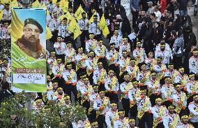 Hezbollah Fighters and Mourners Attend Funeral of Top Commander Fuad Shukr in Beirut