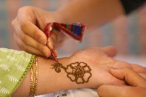 Nepali Hindu Women Apply Mehendi at Kathmandu Fair as Part of Sacred Shrawan Ritual