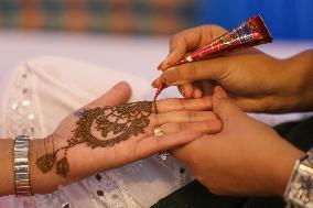 Nepali Hindu Women Apply Mehendi at Kathmandu Fair as Part of Sacred Shrawan Ritual