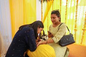 Nepali Hindu Women Apply Mehendi at Kathmandu Fair as Part of Sacred Shrawan Ritual