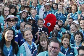 Emmanuel Macron meets volonteers during archery competitions at Invalides