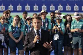 Emmanuel Macron meets volonteers during archery competitions at Invalides