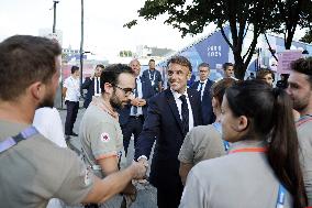 Emmanuel Macron meets volonteers during archery competitions at Invalides