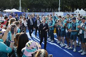 Emmanuel Macron meets volonteers during archery competitions at Invalides