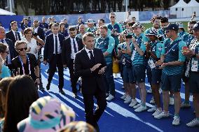 Emmanuel Macron meets volonteers during archery competitions at Invalides