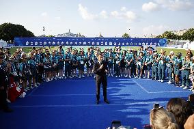 Emmanuel Macron meets volonteers during archery competitions at Invalides